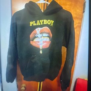 A used playboy hoodie. Will be cleaned before shipping. Price is negotiable